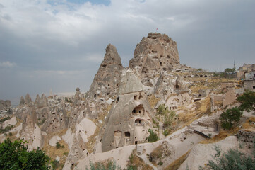 Ancient troglodyte village of Uchisar, in Cappadocia (Central Anatolia, Turkey). Fairy chimneys
