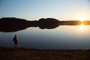 Fototapeta premium sunset as child plays