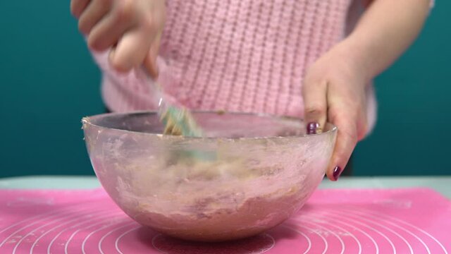 Add flour to the dough and stir in a glass bowl. Making baking dough