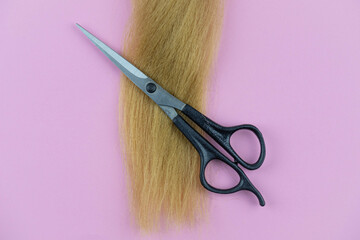 Professional hair dresser tools with copy space on trendy pink background. Stylist equipment set....