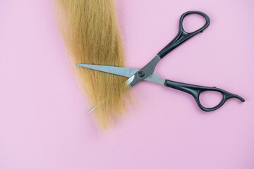 Professional hair dresser tools with copy space on trendy pink background. Stylist equipment set....