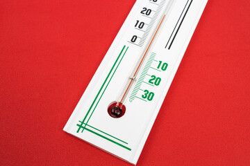 climate celsius thermometer isolated on red background. meteorology concept