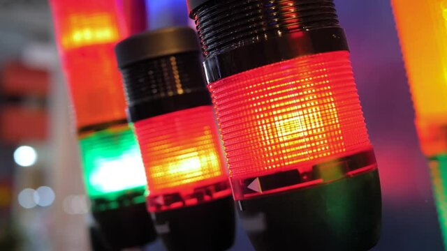 Close up of alarm lamp signal warning flashing lights for industrial machinery at emergency, support and services exhibition. Danger, legal, alert light, attention, hazard and manufacturing concept