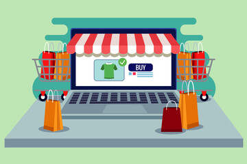 online shopping technology in laptop with shopping bags and carts © Jemastock