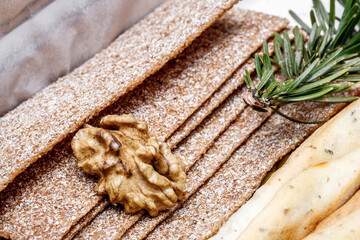 Walnut on biscuit texture, walnut kernel. Healthy food from walnuts.