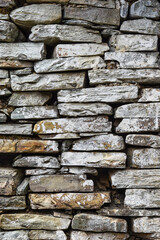 Weathered wall from wild stones