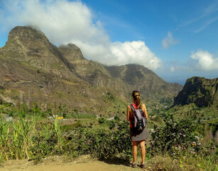 Cape Verde, Santo Antao island, woman during walking tour with great landscape in background, solo.