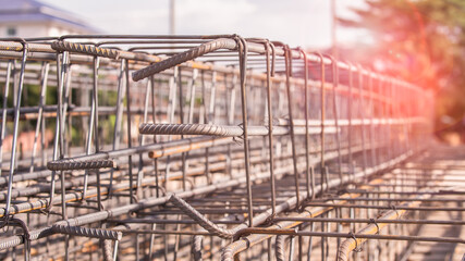 Construction worker Making Reinforcement steel rod and deformed bar with rebar at construction site.