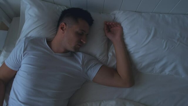 The night sleep of handsome man