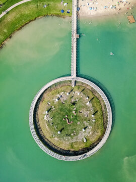 Aerial view of Rabbit island and rounded bridge in Naisiai, Lithuania