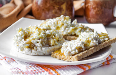 breakfast of bread with cottage cheese and honey