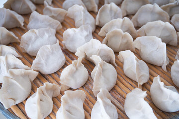 Fototapeta na wymiar White dumplings made in Chinese festivals