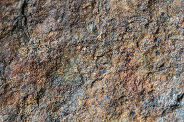 Macro photo of the fusion crust from a Chondrite Meteorite, piece of rock formed in outer space in the early stages of Solar System as asteroids. This meteorite comes from an asteroid fall at Atacama