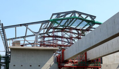 Metallic frame on reinforced concrete structure at an elevated construction site