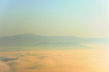 Surreal landscape of morning foggy..Morning clouds at sunrise.Landscape of fog and mountains of northern Thailand.