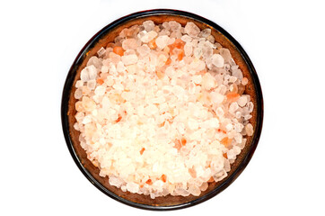 pink himalayan salt in ceramic plate isolated on white background, concept of healthy spices and food