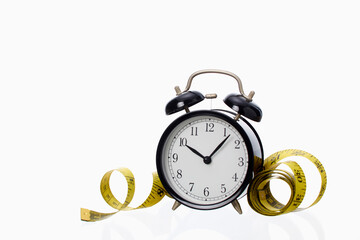 Alarm clock with Yellow measuring tape