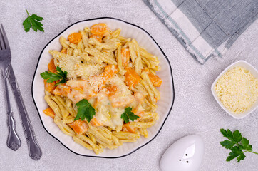Pasta with pumpkin in white sauce