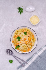 Pasta with pumpkin in white sauce