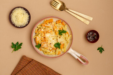 Pasta with pumpkin in white sauce