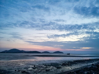 Sunrise and low tide at Phuket bay