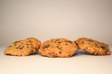  a pile of alomod chocolate cookie on white background