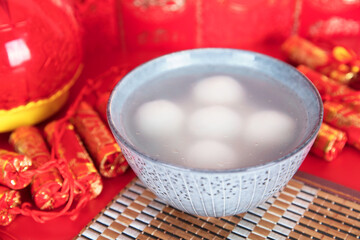 A bowl of dumplings or Lantern Festival on a festive background