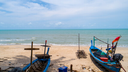 A fishing boat moored on the beach