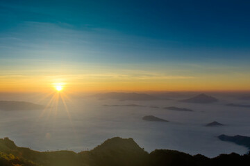 Fototapeta na wymiar Sunrise is full of sea of fog, phu chi dao, Thailand
