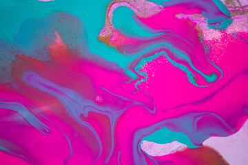 Blue and pink liquid ink pattern. Abstract background