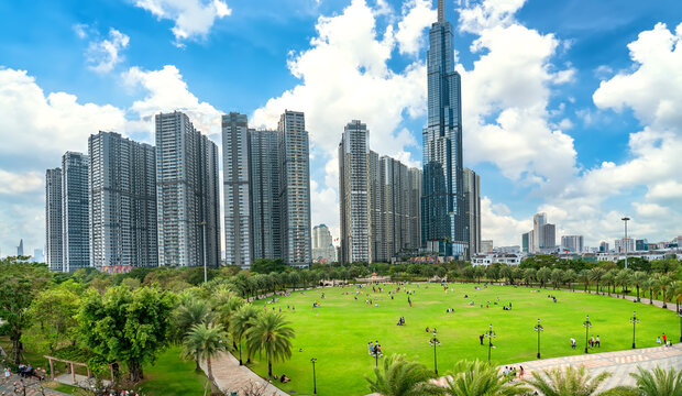 Skyscrapers viewed from below towards sky represents urban development with modern architecture to bring international in Ho Chi Minh City, Vietnam