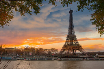 Fototapeta na wymiar Paris Eiffel Tower and river Seine in Paris, France. Eiffel Tower is one of the most iconic landmarks of Paris