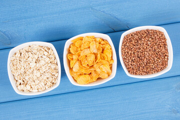 Buckwheat, cornflakes and oatmeal containing vitamin B2, natural minerals and fiber, healthy nutrition