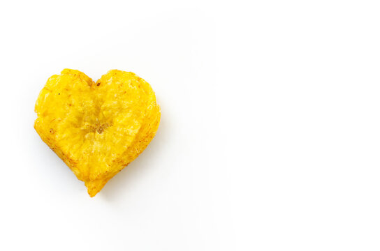 Heart shaped fried plantain isolated on white background