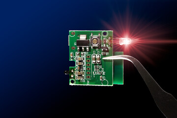 Microcontroller circuit board with infrared led light emitting diode electronic part closeup