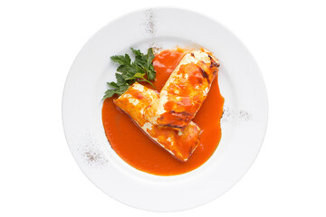 Traditional stuffed cabbage with minced meat and rice, served in a tomato sauce. Restaurant service concept. Isolated.