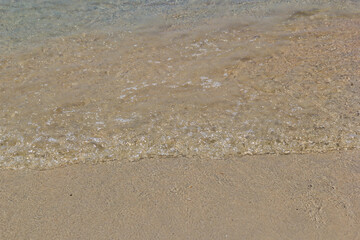 Fototapeta na wymiar Sea and beach has small wave
