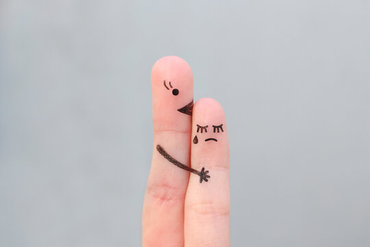 Fingers art of people. Child cries, mother reassures his.