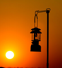 Vintage lamp in a backlit style with camping Hurricane lamp