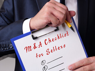  Financial concept meaning Mergers and Acquisitions M&A Checklist for Sellers with inscription on...
