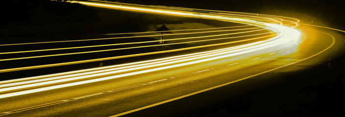abstract yellow car lights at night. long exposure