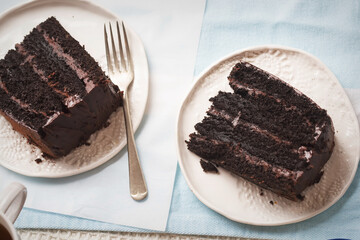 Chocolate layered cake. Dark chocolate cake made on buttermilk and cola