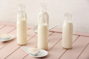 Bottles of rice milk on table