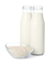 Obraz na płótnie Canvas Bottles of rice milk on white background