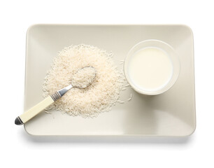 Glass of rice milk on white background