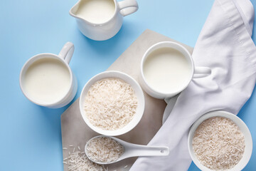 Healthy rice milk on color background