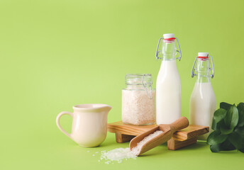 Healthy rice milk on color background