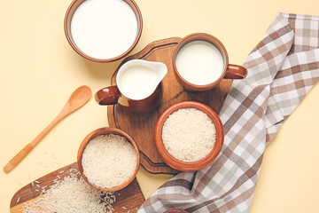 Healthy rice milk on color background