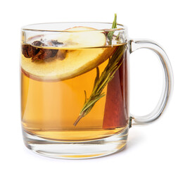 Tasty drink with spices and apple slices in cup on white background
