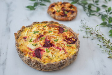 Fresh homemade tart with feta cheese and beetroot